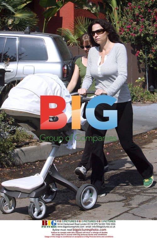 Minnie Driver wheels newborn in Hollywood Hills