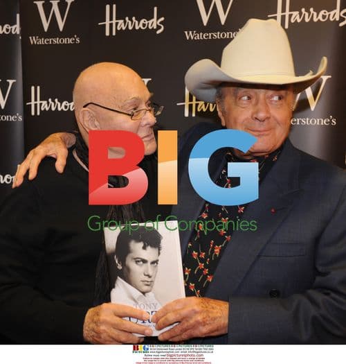 Tony Curtis and Mohamed Al-Fayed at book signing