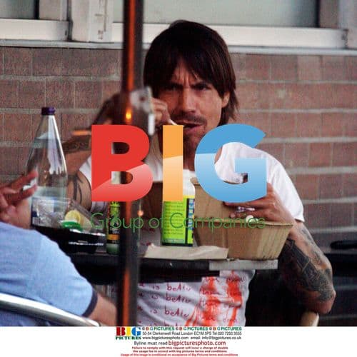 Anthony Kiedis pulls funny faces at lunch