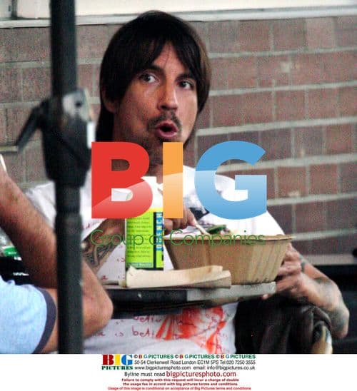 Anthony Kiedis makes funny faces at lunch