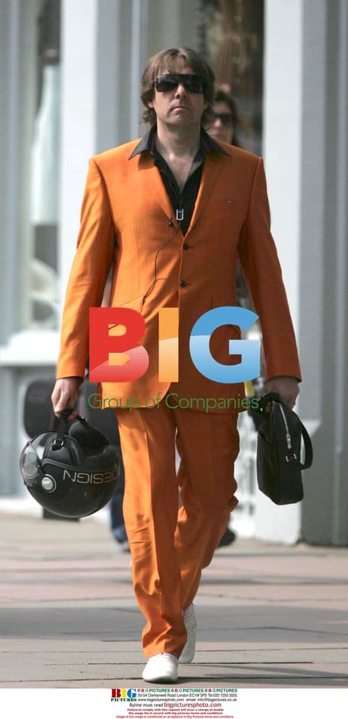 Celebrity on Orange Moped