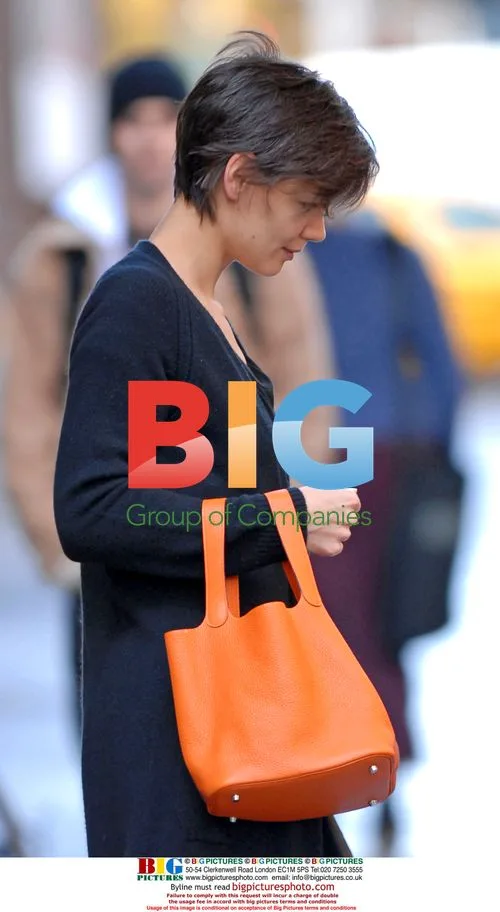 Actress Katie Holmes leaves apartment