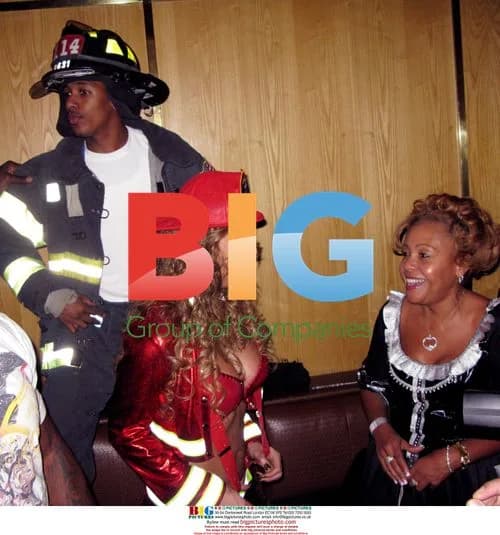 Mariah, Nick, Busta at Halloween party