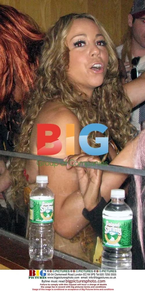 Mariah Carey, Nick Cannon and Busta Rhymes at Halloween party