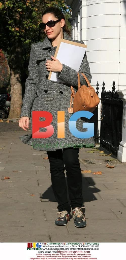 Kelly Brook in colorful trainers