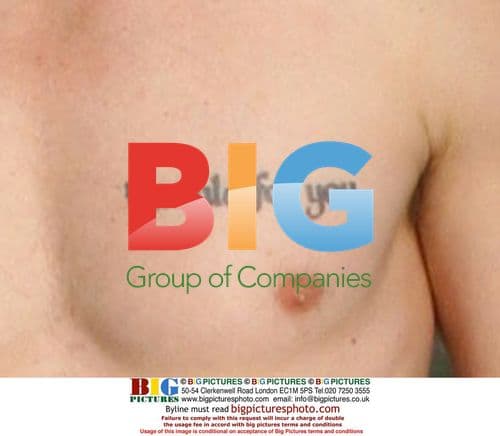 Alicia Silverstone and husband on beach