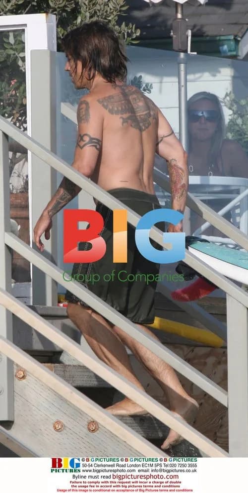 Anthony Kiedis surfing with family
