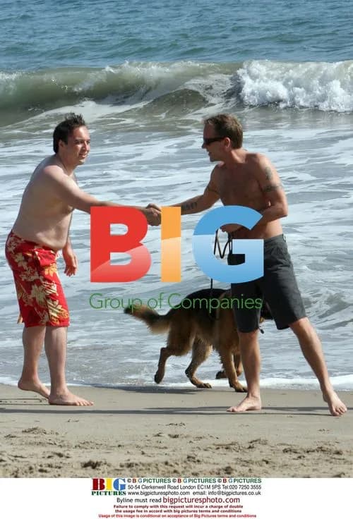 Keifer Sutherland walking dog on Malibu beach