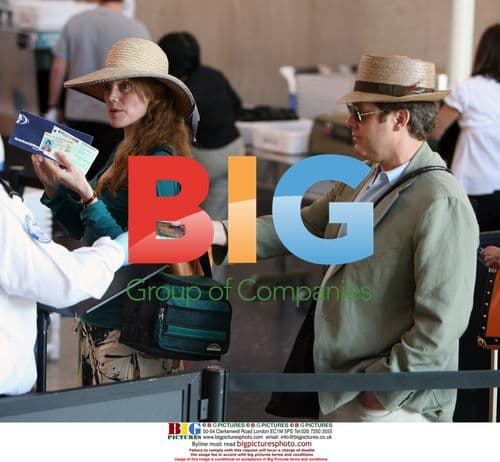 James Spader and pregnant girlfriend depart LAX