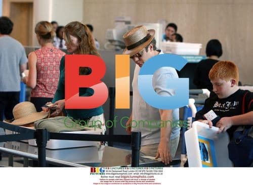 James Spader and girlfriend depart LAX