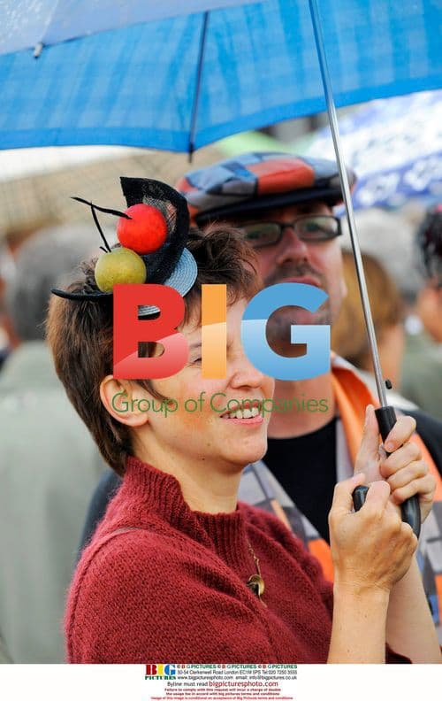 Spectators in fancy hats at Belgian horse race