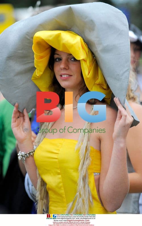 Spectators in Flamboyant Hats at Belgian Horse Race