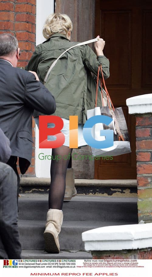 Ronnie Wood arrives at new home with girlfriend