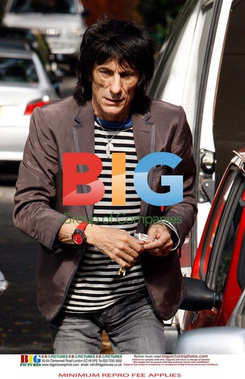 Ronnie Wood Arrives Home with Girlfriend