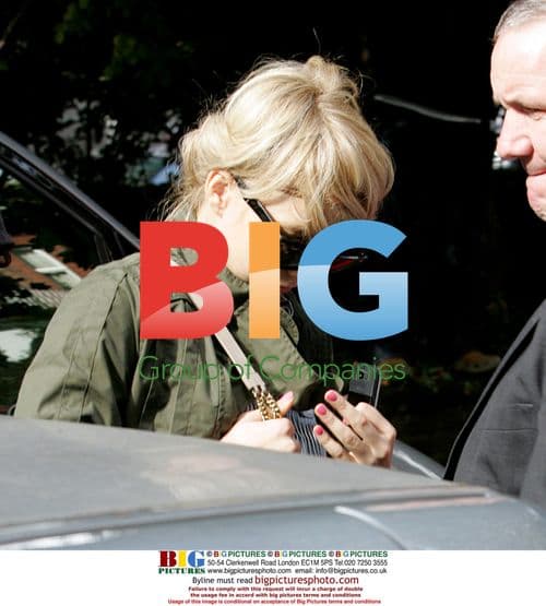 Ronnie Wood Arrives Home with Girlfriend