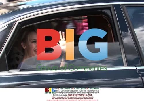 Kylie Minogue Leaving Buckingham Palace With OBE