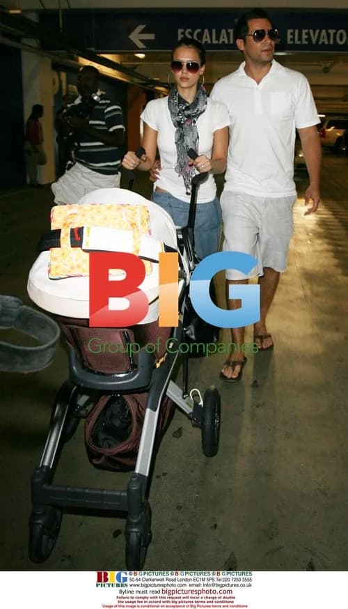 Jessica Alba and Cash Warren shop with baby