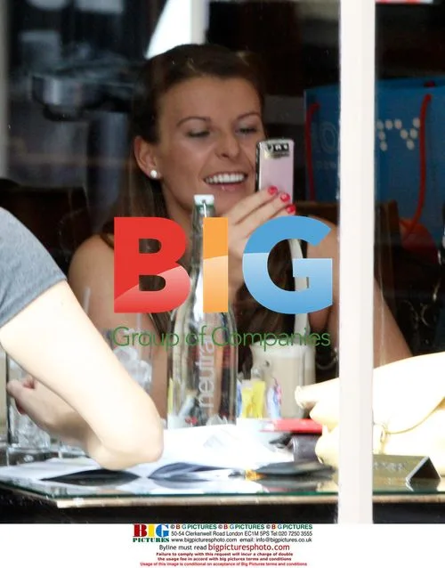 Coleen Rooney drinks with friend in London