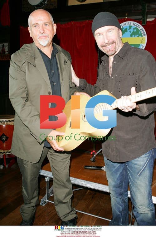 Peter Gabriel receives Amnesty award from The Edge