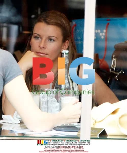 Coleen Rooney drinks with friend in London