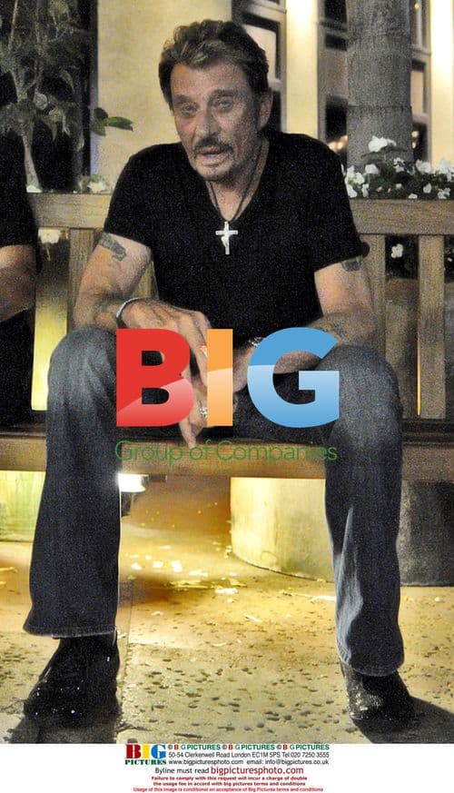 Johny Hallyday with wife and photographer