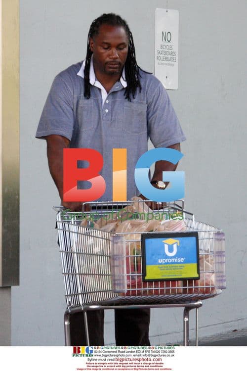 Lennox Lewis goes grocery shopping