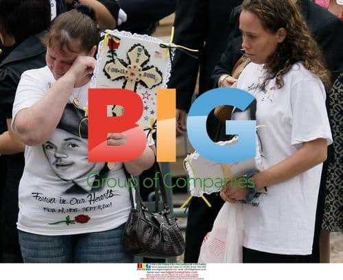 Woman mourns at 9/11 commemoration