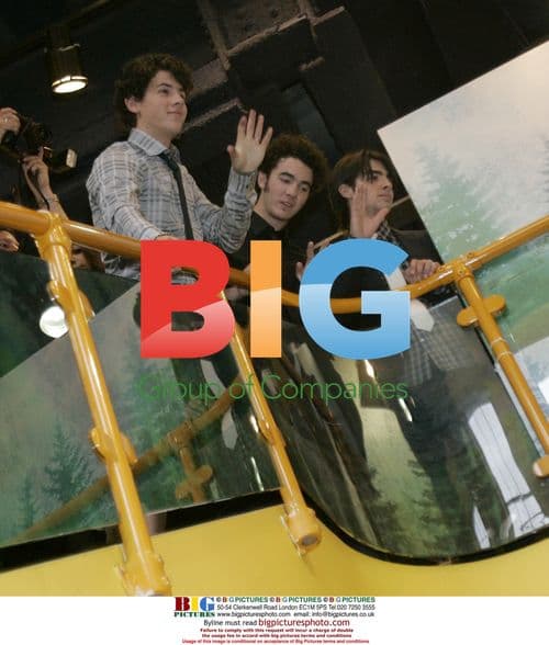 Jonas Brothers greet fans at Disney store in London