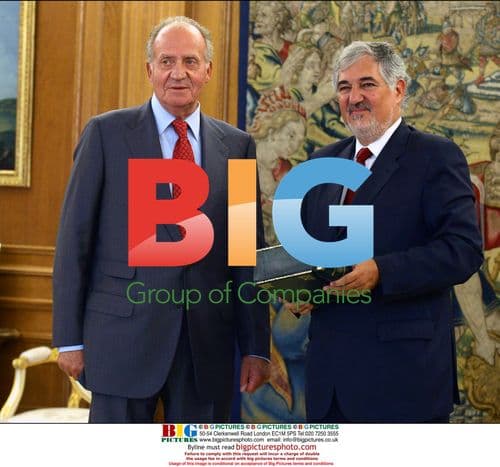 King Juan Carlos receives Candido Conde-Pumpido