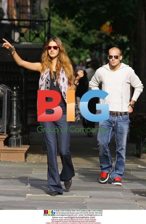 Footballer Freddie Ljungberg with two women