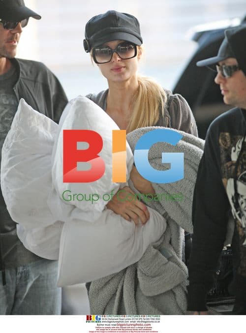 Paris Hilton and Benji Madden Arrive at Toronto Airport