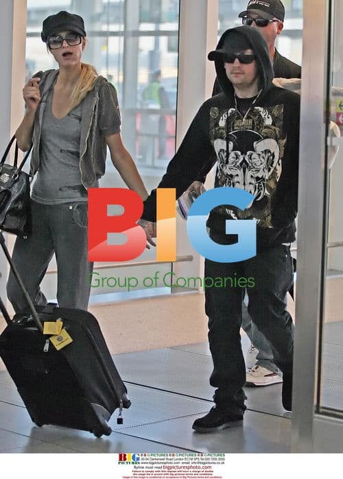 Paris Hilton and BF Benji Madden Arrive at Toronto Airport