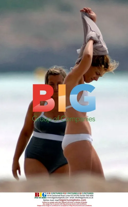 Princess Cristina and Iaki Irdangarin at beach in Menorca