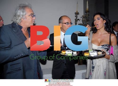 Flavio Briatore and wife Elizabeth Gregoraci in Florence