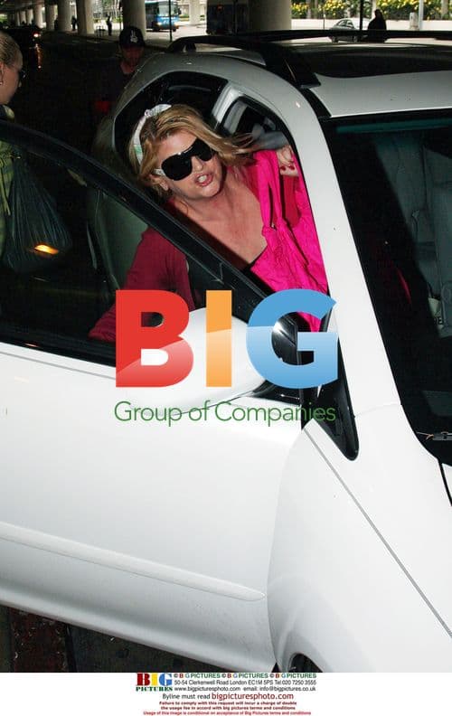 Kirstie Alley Arrives at LAX in Pink