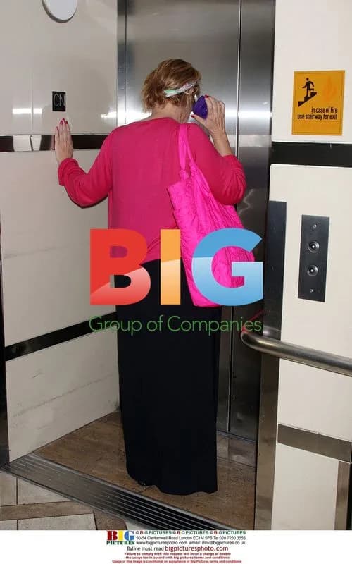 Kirstie Alley at LAX in Pink