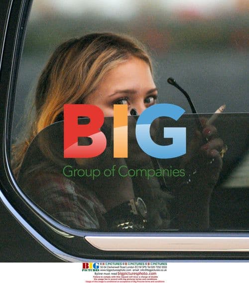 Mary-Kate Olsen arrives at LAX, smokes in limo