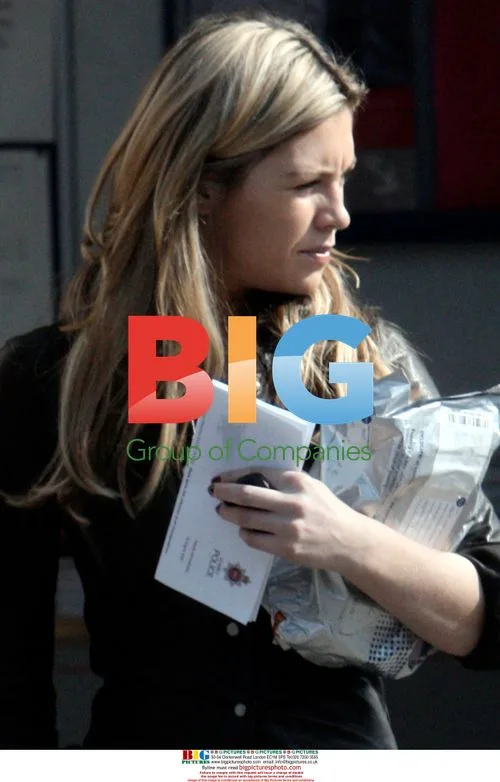 Abigail Clancy Seen with Police Letter in Surrey