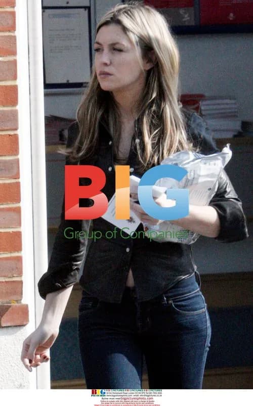Abigail Clancy seen with police letter in Surrey
