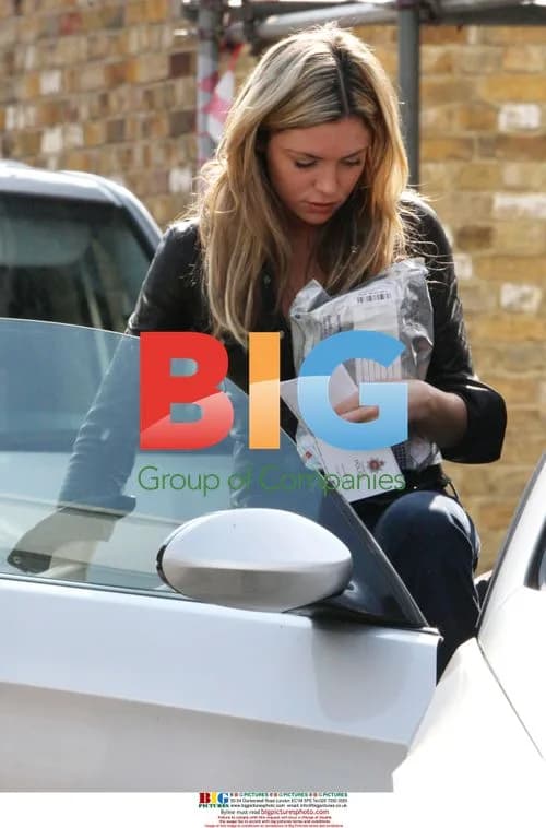 Abigail Clancy Seen with Police Letter
