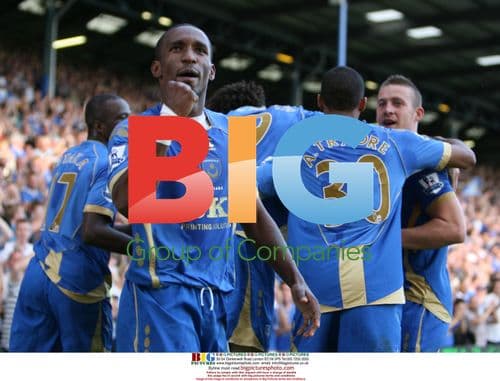 Lassana Diarra celebrates goal with Pompey fans