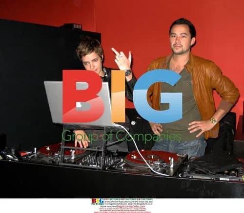 Samantha Ronson makes a gesture at TV Guide party