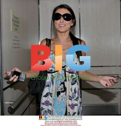 Audrina Patridge Enters Elevator