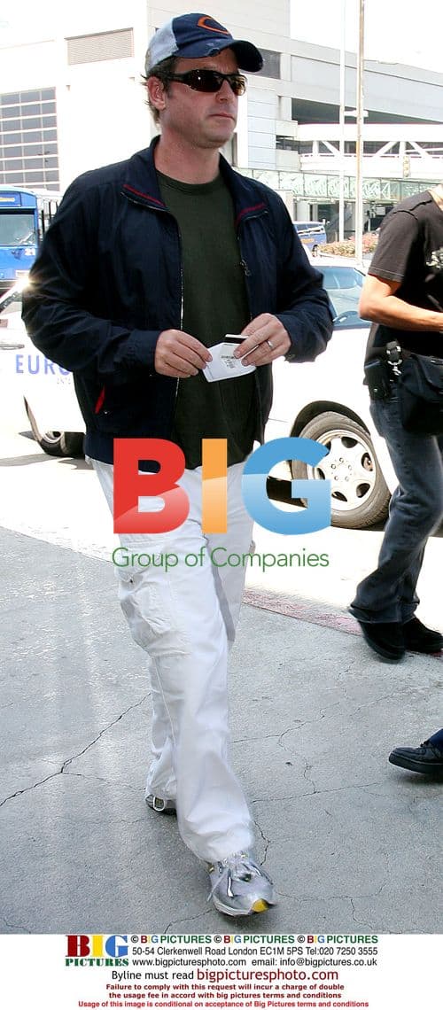 Greg Kinnear Arrives at LAX