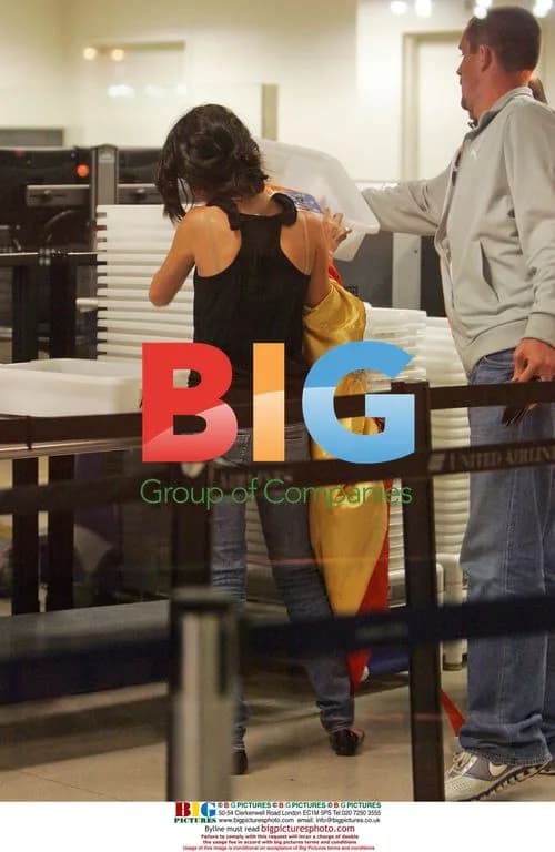 Selena Gomez Departs LAX with Family