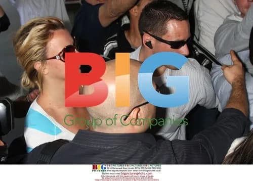 Britney Spears Departs LAX Amid Paparazzi