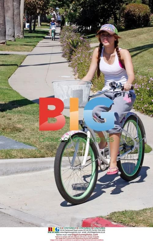 Miley Cyrus Bikes After Trader Joe's