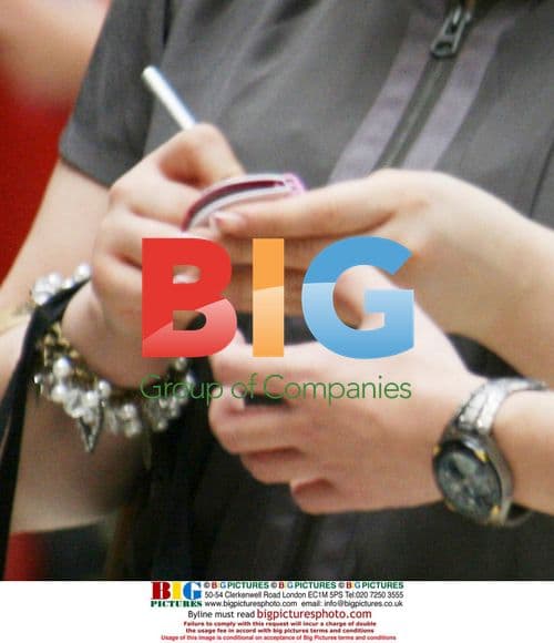 Luke Marsden and Rebecca Shiner signing autographs