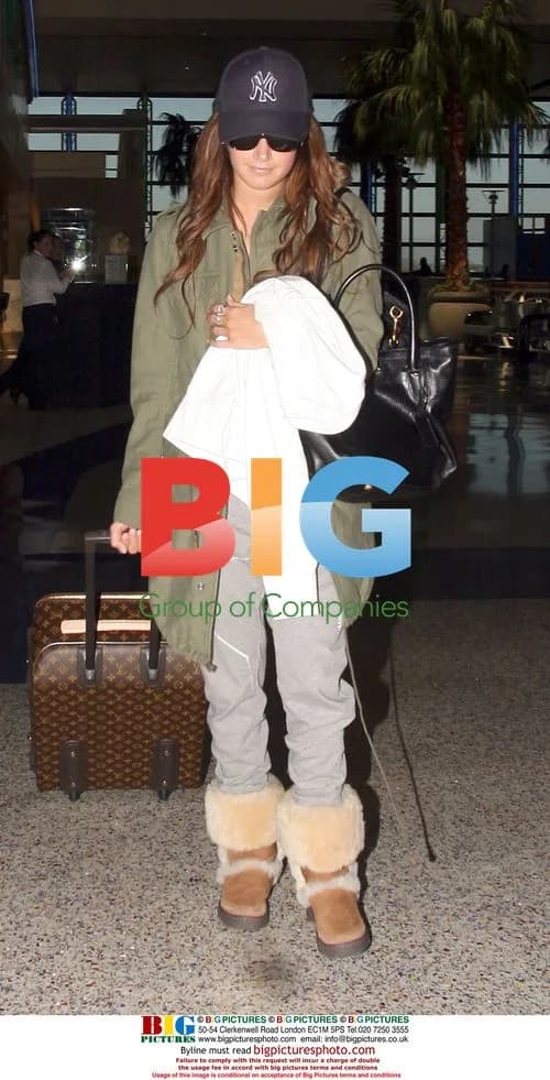 Ashley Tisdale Grabs Bite at LAX