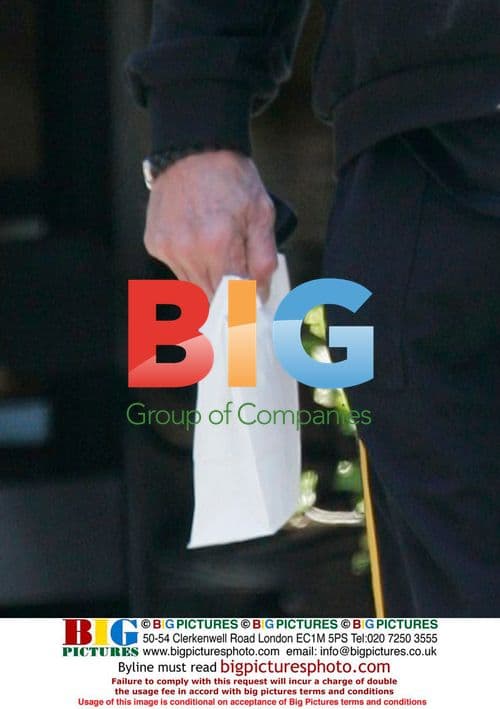 Johnny Hallyday leaves Mulholand Grill